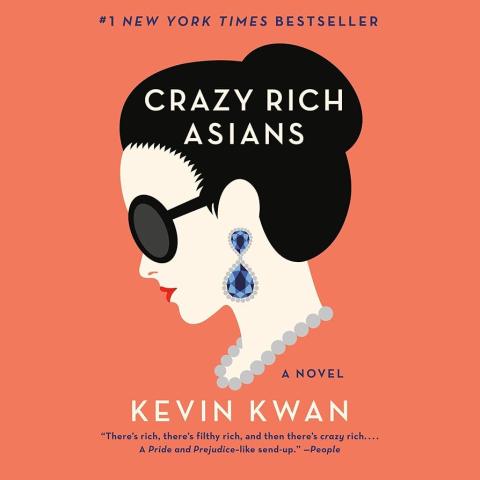 Book cover for "Crazy Rich Asians" with the side view of a woman's head. She has her hair in a bun and is wearing sunglasses, drop earrings and a pearl necklace.