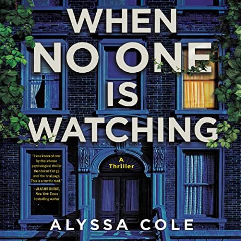 The cover of When No One Is Watching shows the front of an apartment building at night. The light is on in the upper right window and the curtain is drawn back slightly with the lights out in the upper left window.