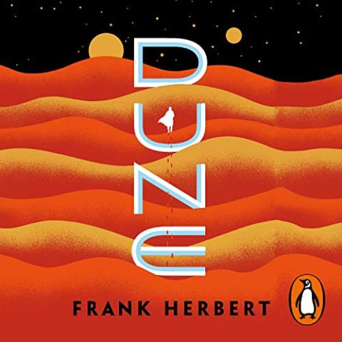 Red and orange horizontally-wavy background, with the top of image in black. "Dune" is written vertically down the middle in white and blue.