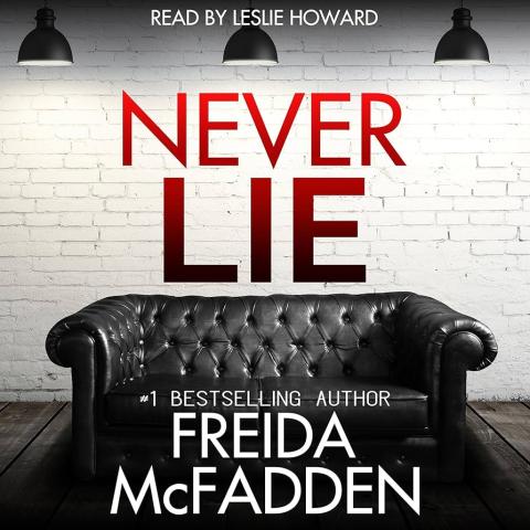 Cover of "Never Lie" that has a black couch with three lights above it in front of a white brick wall on a dark-brown wooden floor.