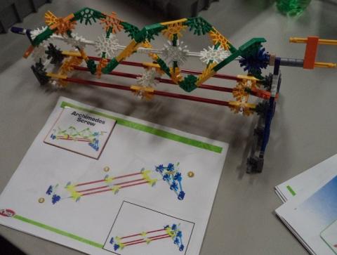 K'Nex building kit used to make an Archimedes screw with instructions on how to make it with the design completed.