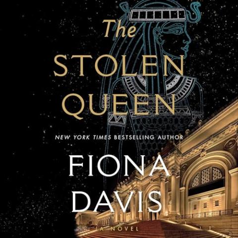 Cover of "The Stolen Queen" showing a panorama view of a museum lit up at night with a starry sky. Up in the sky is a drawing of an Egyptian queen. The words "The Stolen Queen, New York Times Bestselling Author Fiona Davis" are centered in the image.