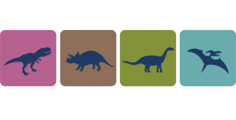 Picture of four dinosaur silhouettes on a pink, brown, green and blue block background.